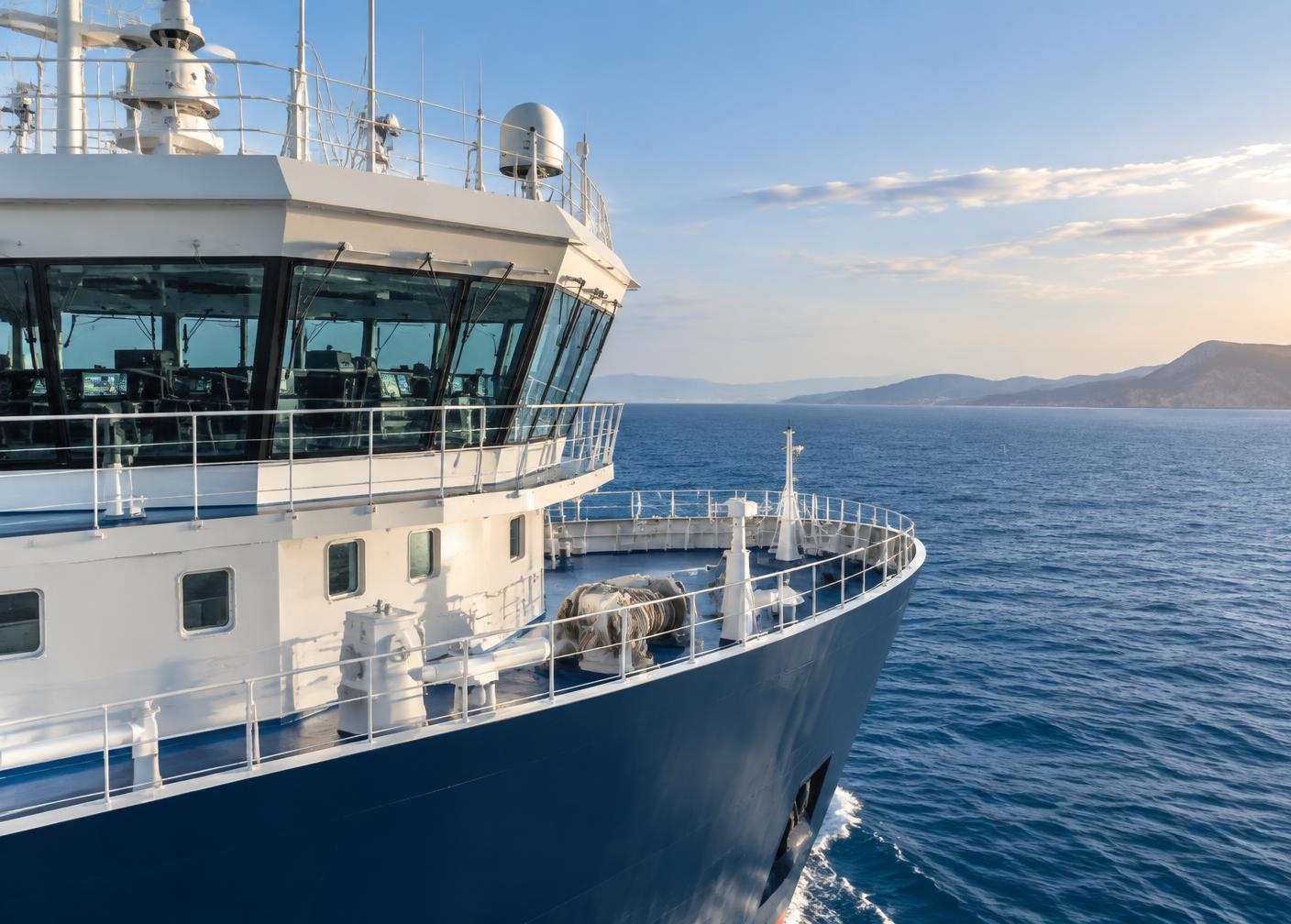 Modern vessel bridge and bow at sea